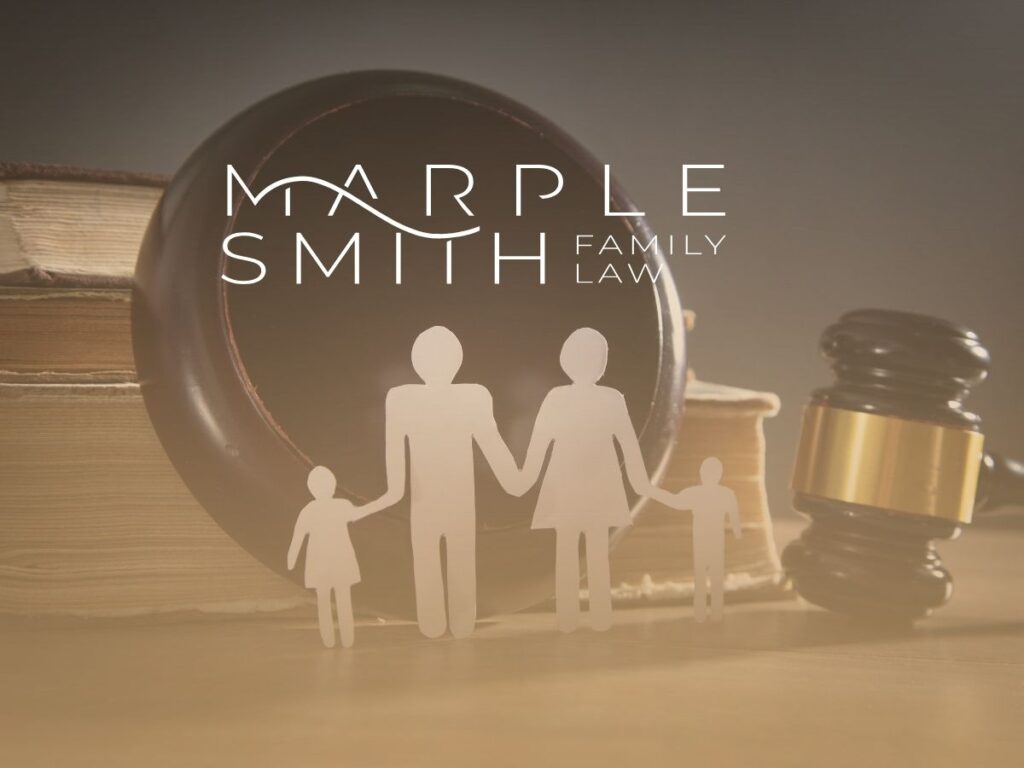 Marple Smith Family Law logo over gavel with paper cutout of family